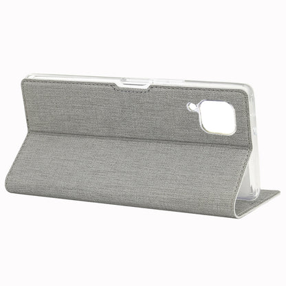 Grey magnetic flip phone case in open position with card holder panel