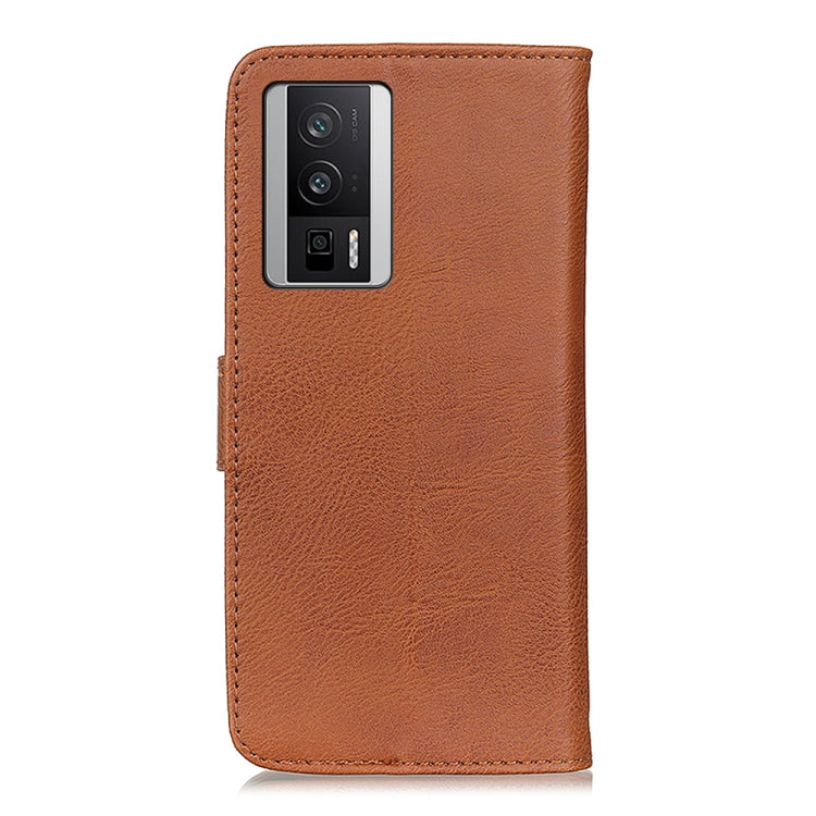Brown leather phone case with camera cutout and stitched border.