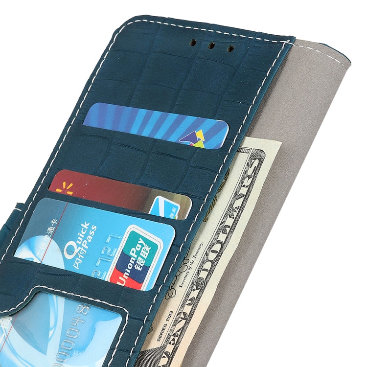 Teal crocodile-texture leather phone case showing card slots and cutouts for IDs.