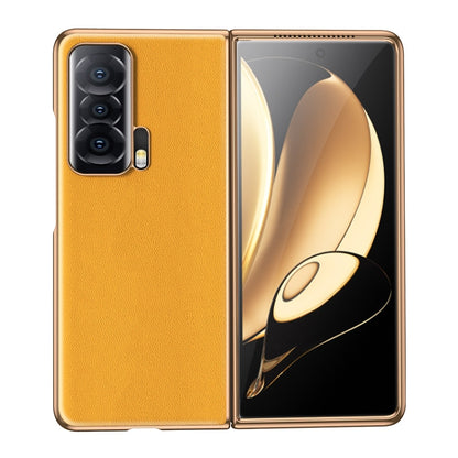 Yellow leather folding phone case with textured finish, camera cutout, and hinge