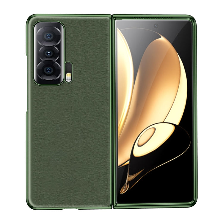 Green leather folding phone case with textured finish, camera cutout, and hinge