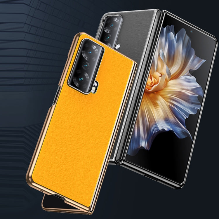 Yellow leather folding phone case open view with camera cutout and fold design