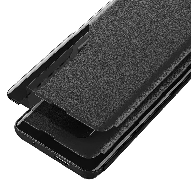 Black leather flip phone case with holder arm and raised screen cover