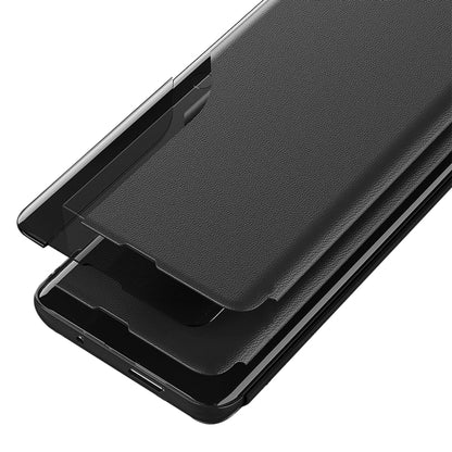 Black leather flip phone case with holder arm and raised screen cover