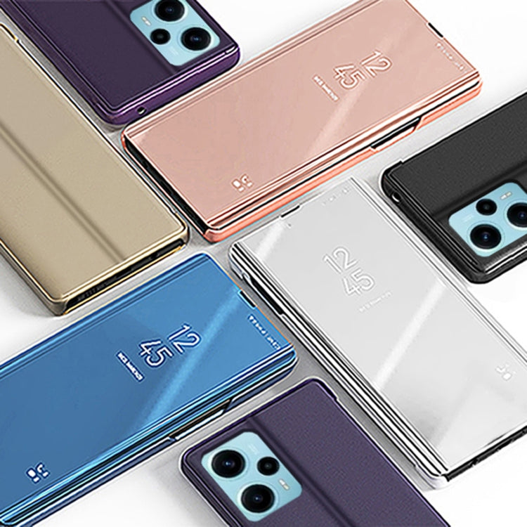 Assorted plated flip phone cases with mirror kickstand, leather-style, in multiple colors.