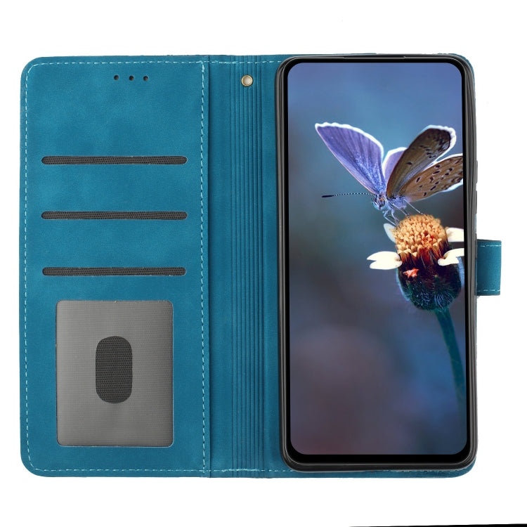 Blue embossed flower leather wallet phone case, front slots and phone inside