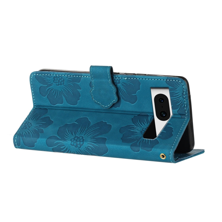 Blue embossed flower leather phone case with flip stand and side camera cutout