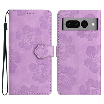 Purple embossed flower leather phone case with flip cover and wrist strap.