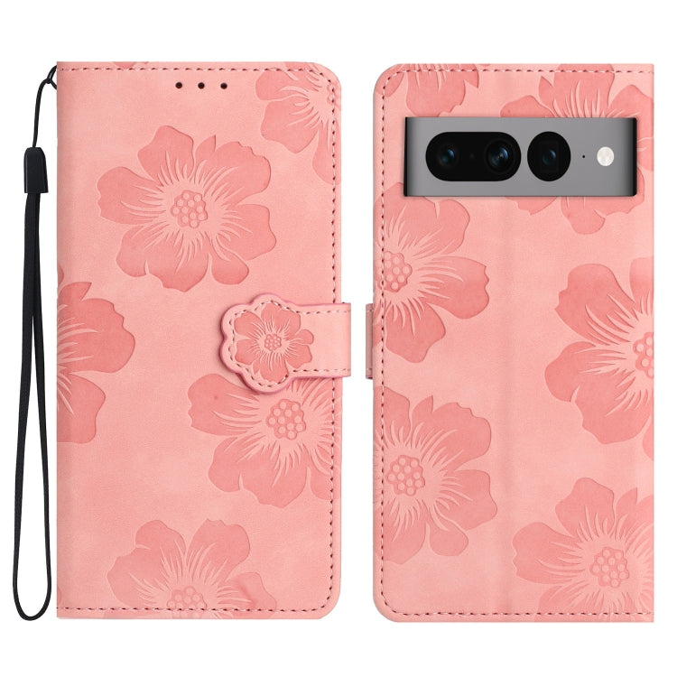 Pink embossed flower leather phone case with flip cover and wrist strap.