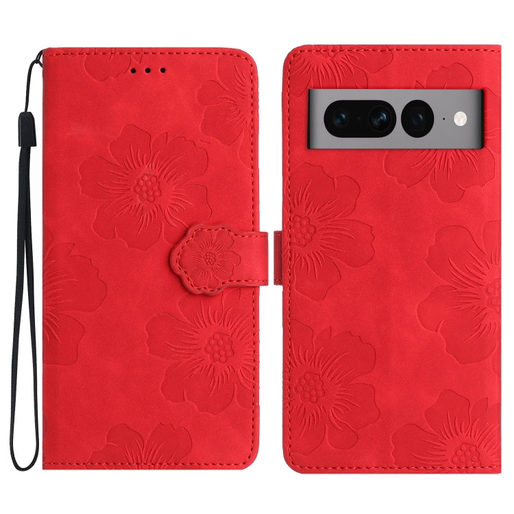 Red embossed flower leather phone case with flip cover and wrist strap.