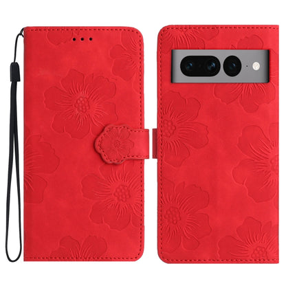 Red embossed flower leather phone case with flip cover and wrist strap.
