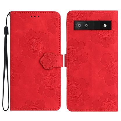 Bright red embossed floral leather phone case with flip cover and camera cutout.