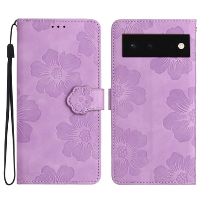 Purple floral embossed leather-style phone case with flip cover and wrist strap