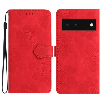 Red floral embossed leather-style phone case with flip cover and wrist strap