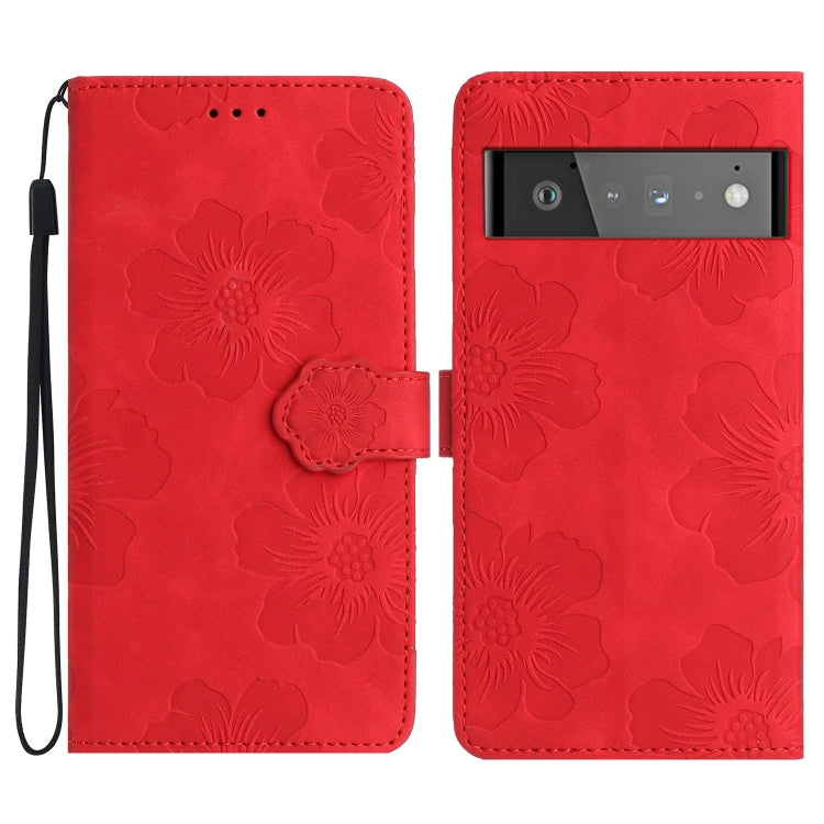 Red floral embossed leather-style phone case with flip cover and wrist strap