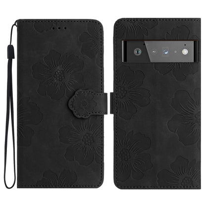 Flower-embossed leather phone case in dark black with wrist strap and card holder