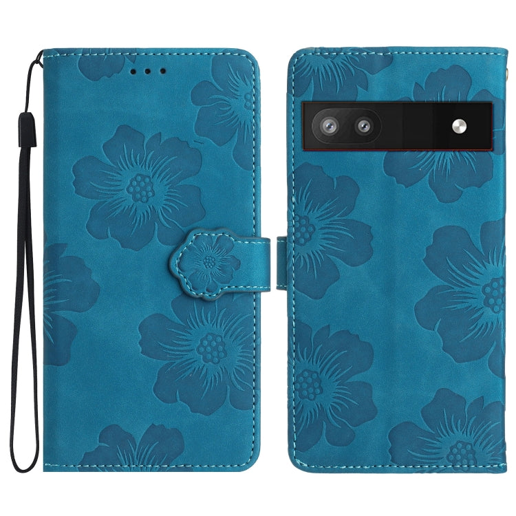 Flower-embossed leather phone case in blue with wrist strap and card holder
