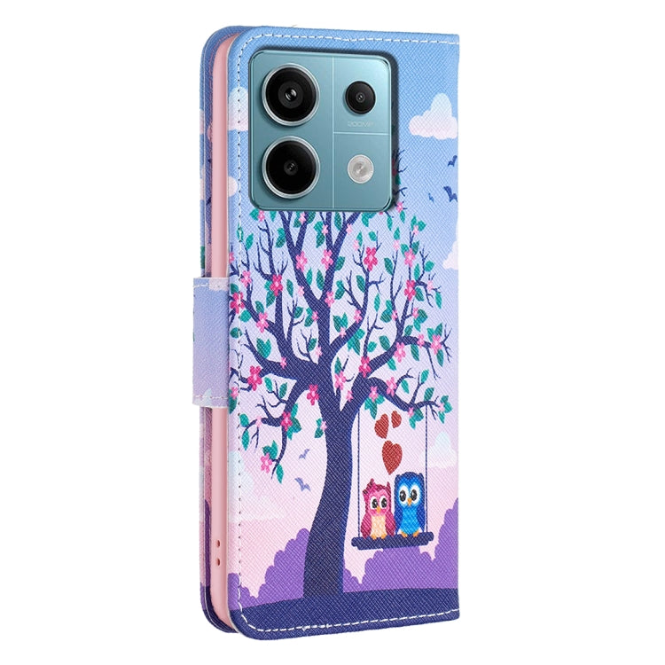 Leather phone case with owl-and-tree artwork, flip cover open, phone back shown.