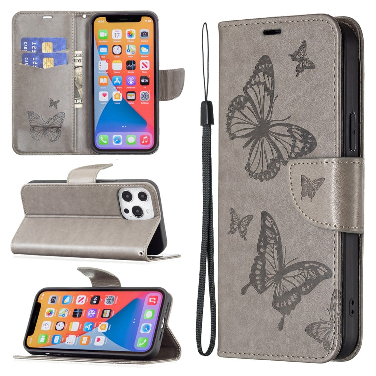Embossed leather phone case in dark grey with butterfly pattern, flip cover, wrist strap