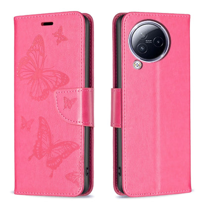 Coral pink butterfly embossed leather phone case with folio flap and camera cutout.