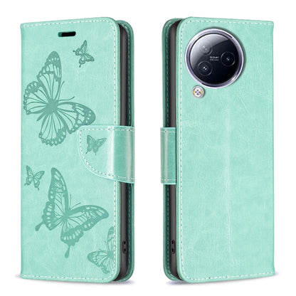 Mint green leather phone case with embossed butterflies, flip cover with side strap.