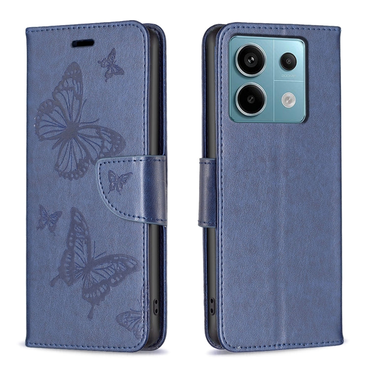 Blue embossed leather phone case with butterfly pattern and flip strap