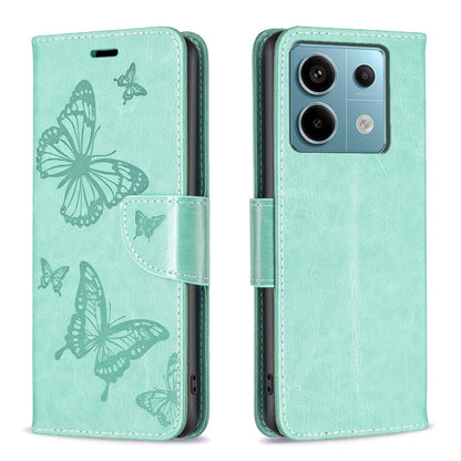 Mint green embossed leather phone case with butterfly pattern and flip strap
