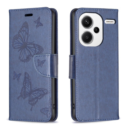 Blue embossed leather phone case with butterfly pattern and folio strap closure