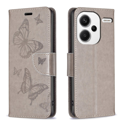Beige embossed leather phone case with butterfly pattern and folio strap closure