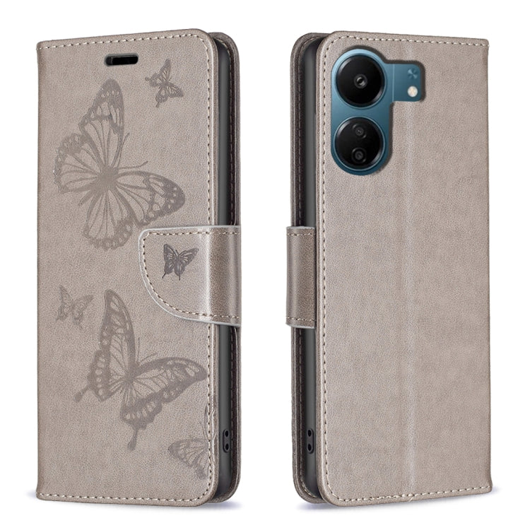 Beige embossed leather phone case with butterfly pattern and folio strap closure