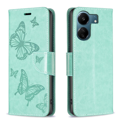 Light teal embossed leather phone case with butterfly pattern and folio strap closure