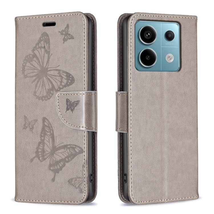 Grey embossed butterfly leather-style phone case with flip cover and camera cutout