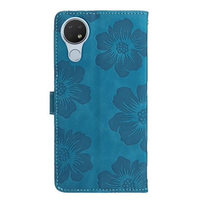 Blue floral embossed leather folio phone case with camera cutout and kickstand fold