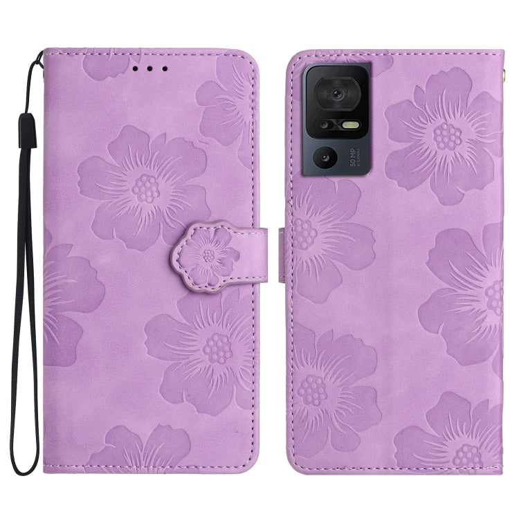 Purple flower-embossed leather phone case with folio cover and wrist strap