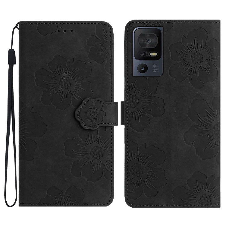 Black floral-embossed folio phone case with flower latch and wrist strap