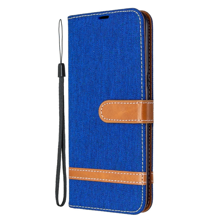Blue denim wallet flip phone case with lanyard loop and stitched brown accents