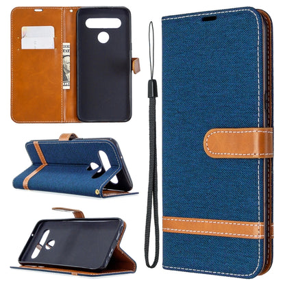 Blue denim wallet flip phone case with card slots, phone holder, and lanyard strap