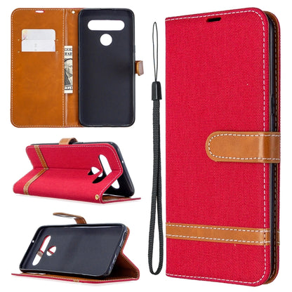 Red denim wallet flip phone case with card slots, phone holder, and lanyard strap
