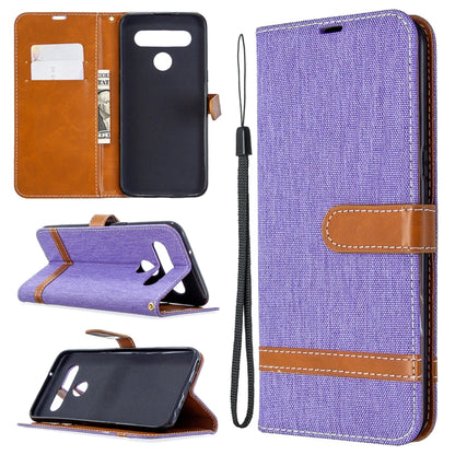 Purple denim-texture flip leather phone case with lanyard, card slots, and stand holder