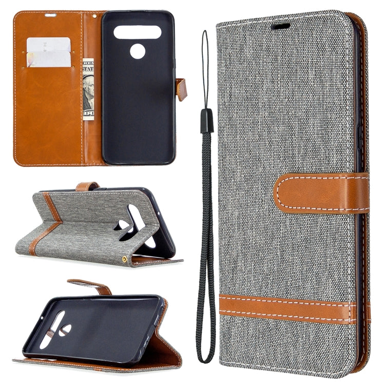 Gray denim-texture flip leather phone case with lanyard, card slots, and stand holder