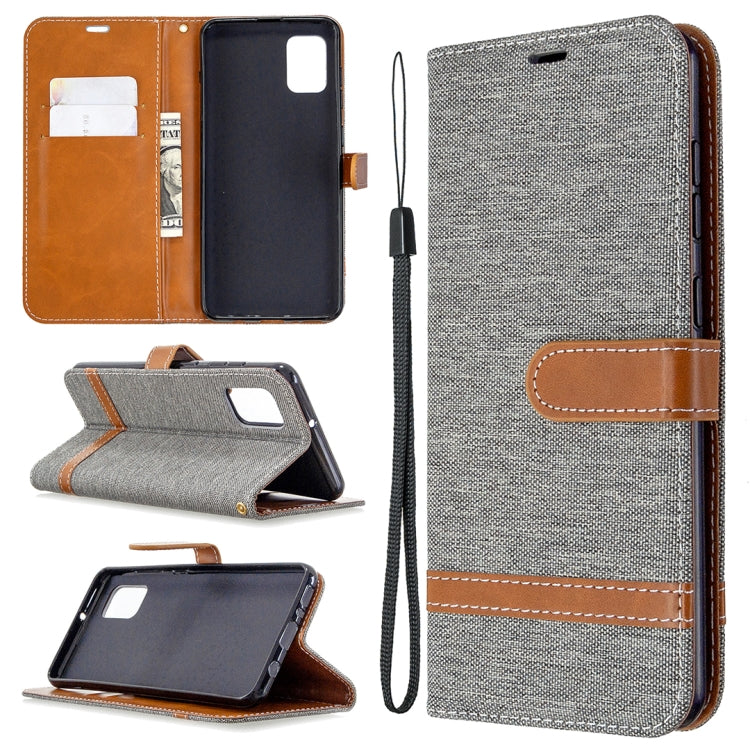 Gray denim phone wallet case with card slots, horizontal flip stand, and wrist lanyard