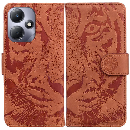 Tan tiger-embossed flip leather phone case with magnetic strap and card slot