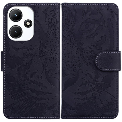 Dark navy tiger embossed flip leather phone case with side strap and camera cutout.