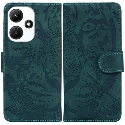 Green tiger embossed flip leather phone case with side strap and camera cutout.