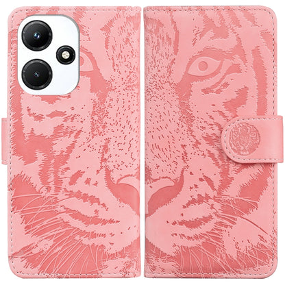 Light pink tiger embossed flip leather phone case with side strap and camera cutout.