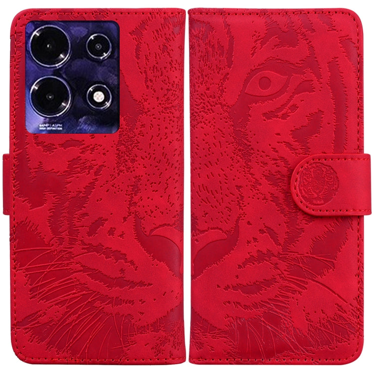 Red tiger-embossed flip leather phone case with snap strap