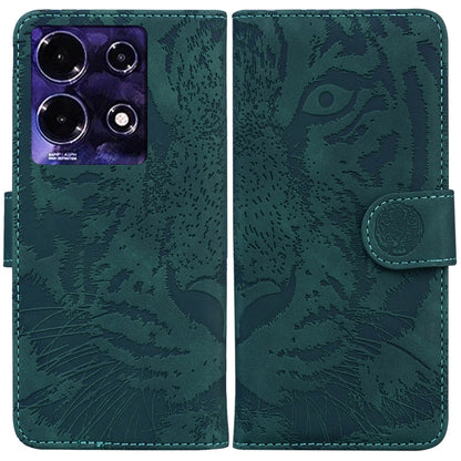 Teal green tiger-embossed flip leather phone case with snap strap