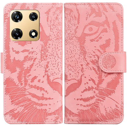 Light pink tiger-embossing flip leather phone case with magnetic strap and camera cutout