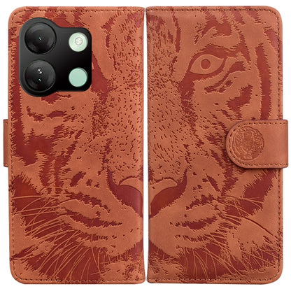 Brown tiger embossed flip leather phone case with side strap and camera cutout.