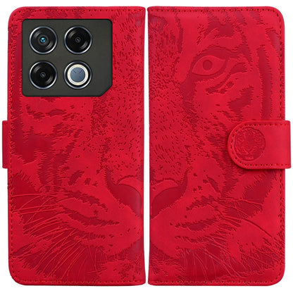 Red tiger-embossed flip leather phone case with camera cutout and side strap